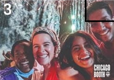 Group of Students Smiling at a Fireworks Event